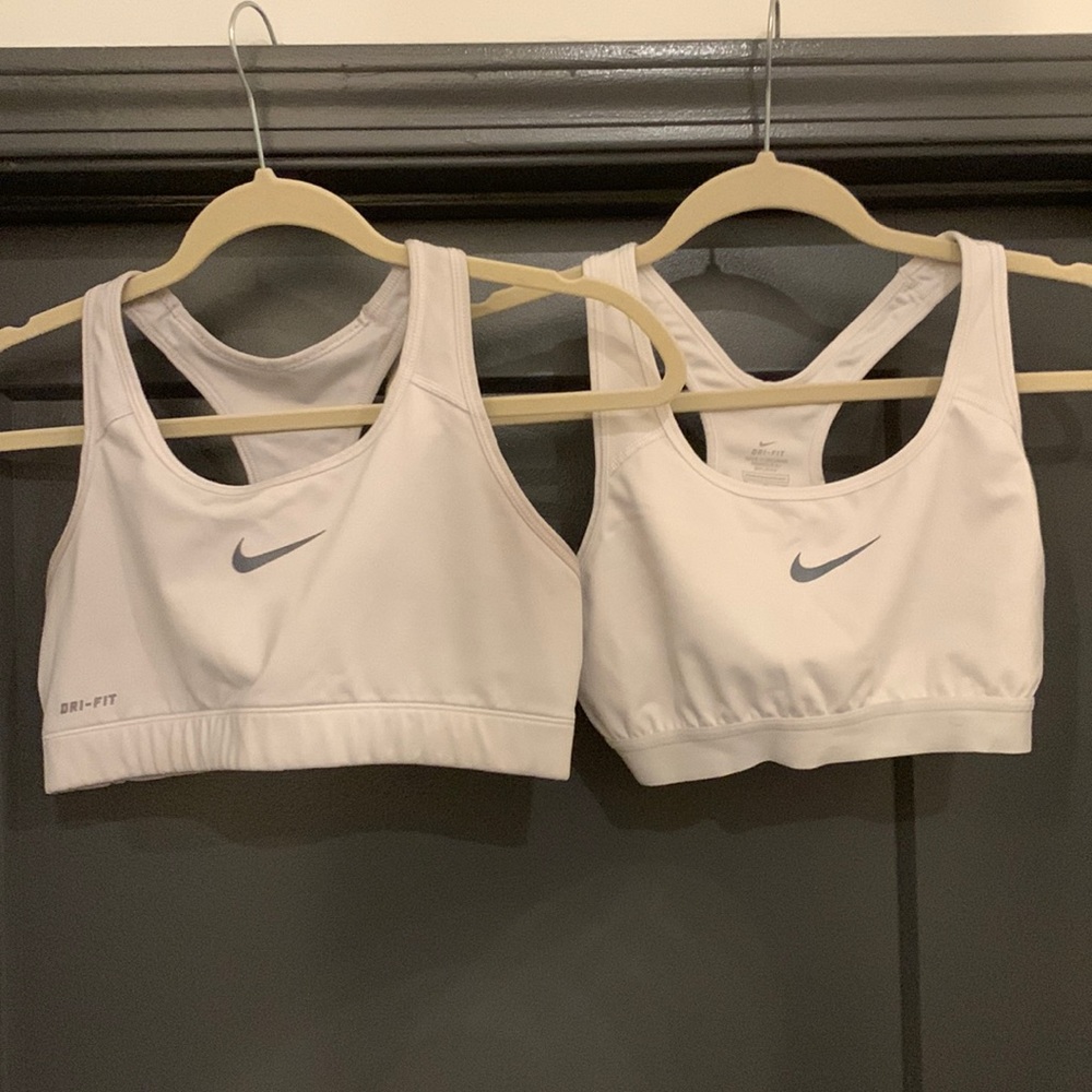 Women’s M set of 2 white Nike sports bras.